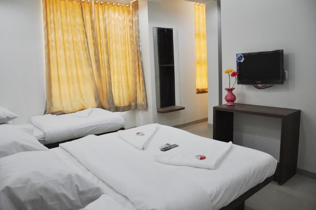 Hotel Sai Srushti Širdi Pokoj fotografie
